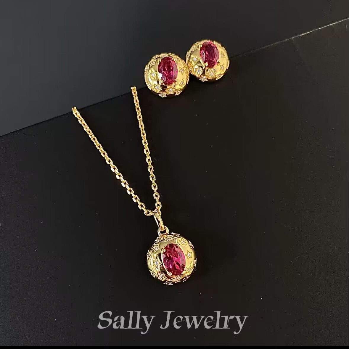 A beautifully crafted Ruby Gypsophila earring and necklace set, featuring delicate, cluster-style designs with vibrant ruby gemstones. The earrings are small, stud-like, and complement the intricate necklace, which showcases a series of sparkling ruby stones arranged in a floral pattern. Both pieces are set in a polished silver or gold-tone metal, creating an elegant and sophisticated look.