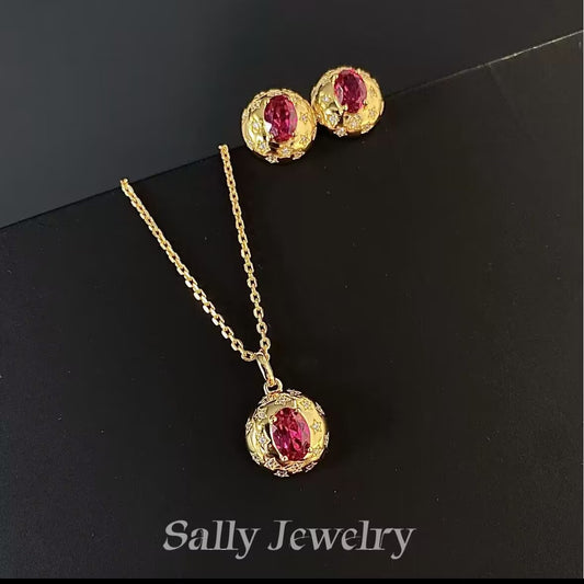 A beautifully crafted Ruby Gypsophila earring and necklace set, featuring delicate, cluster-style designs with vibrant ruby gemstones. The earrings are small, stud-like, and complement the intricate necklace, which showcases a series of sparkling ruby stones arranged in a floral pattern. Both pieces are set in a polished silver or gold-tone metal, creating an elegant and sophisticated look.